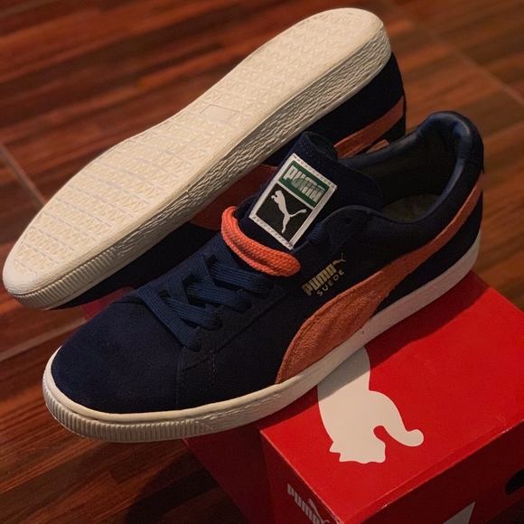 blue and orange puma shoes